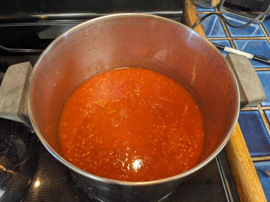 Hot pepper puree in a pot